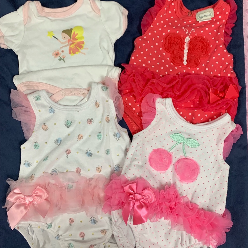 Four onesies by Kyle & Deena 0-3 months